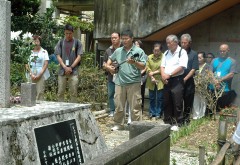 Okinawan Americans come from Hawaii to play the sanshin at a requiem held at the Miyamori Elementary School Memorial