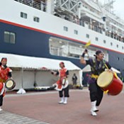 First passengers of an around-the-islands-cruise depart from Naha Port