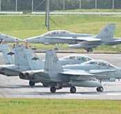 U.S. military aircraft noise halts enrollment ceremonies at elementary schools