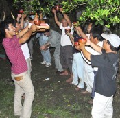 <em>Sutsuupunaka</em> celebration for a full harvest held in Tarama