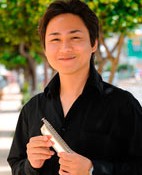Okinawan player comes second in World Harmonica Festival