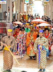 People in traditional Ryukyuan costume parade for Doll's Festival