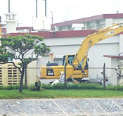 Defense bureau starts removing buildings within Camp Schwab in Henoko to build a new air base
