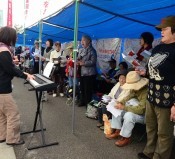Sit-in protesters sing gospel to oppose the construction of a new U.S military base in Henoko