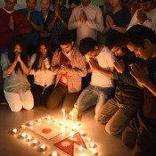 Nepalese students hold memorial service to pray for homeland