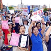 Okinawa youth group protests security bill and new US base
