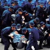 Tokyo riot police join security at Camp Schwab; protester arrested in scuffle