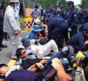 Tensions between protesters and riot police mount over construction of U.S. Marine Corps helipads in Takae