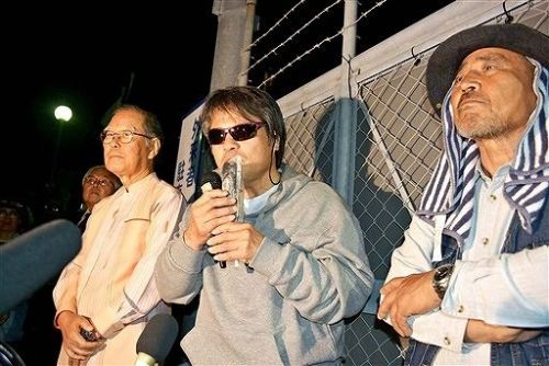 Naha District Court rules arrest of author Shun Medoruma during anti-base protest was illegal