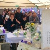 Sixty years after U.S. jet crash kills 18 elementary school pupils, Okinawans pray for peace at memorial ceremony