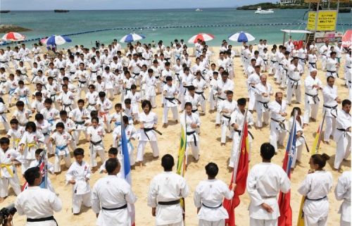 Stunning! 1,000 Karate-ka perform a martial arts demonstration for peace against the backdrop of the blue Okinawa Sea