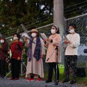 Okinawa Christians sing outside U.S. military base wishing for a peaceful world without fence