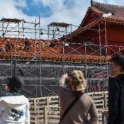 Work begins on replacing the roofing tiles on Hoshimmon Gate at Shuri Castle, planned completion in March