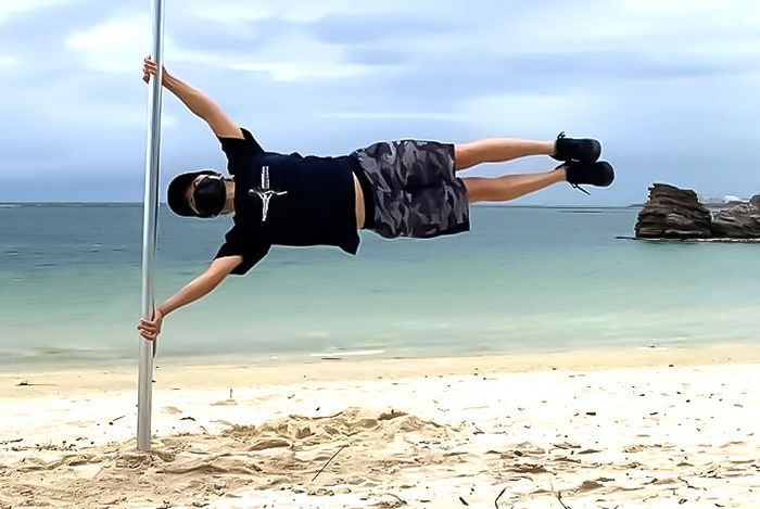 Okinawan Miki Nakamasu sets new Guinness World Record with incredible muscle strength, holding himself up in a “human carp flag” for 36 seconds