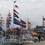 Flags wave at Itoman fishing port for Lunar New Year